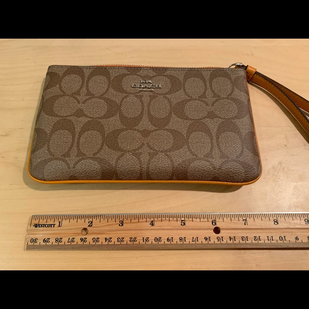 New coach wristlet, large, orange trim